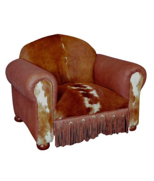 Western armchair with cowhide, full grain leather, fringe and conchos from Rustic Artistry