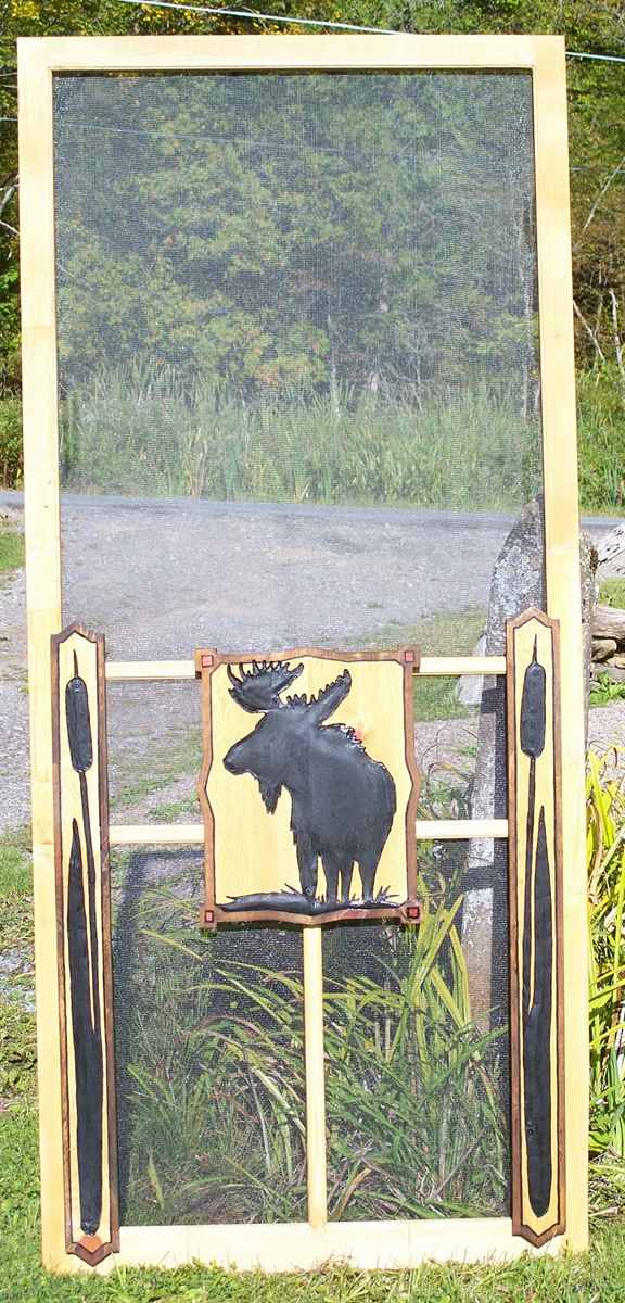 wooden screen door with carving moose