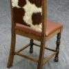 Traditional style cowhide and leather counter stool