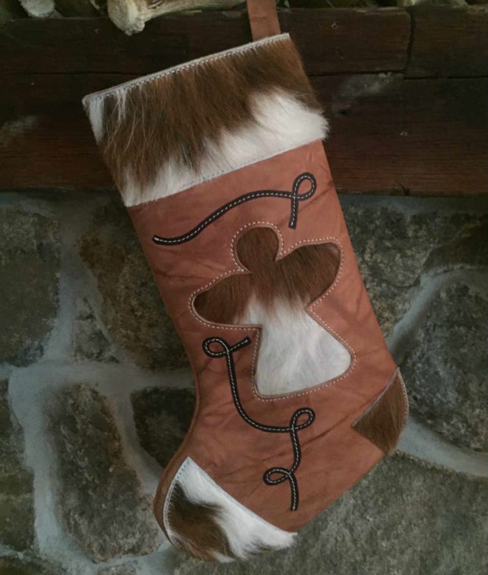 Cowhide Christmas stocking with angel