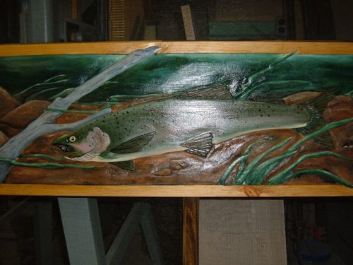close up of fish on wood screen door