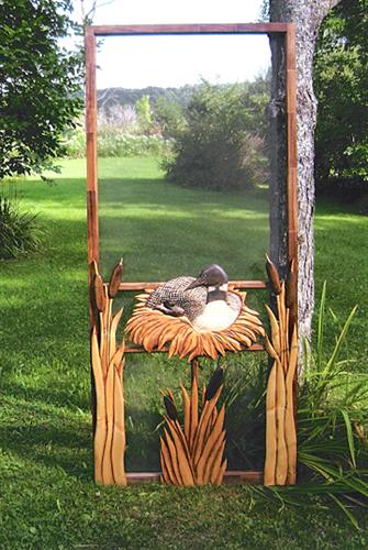 wood screen door hand carved with nesting duck and cattails