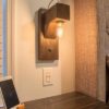 Mounted wood beam wall sconce