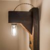 Rustic wood beam wall sconce with Edison bulb