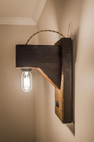 Rustic wood beam wall sconce with Edison bulb