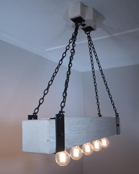 Weathered white stain on wood beam chandelier