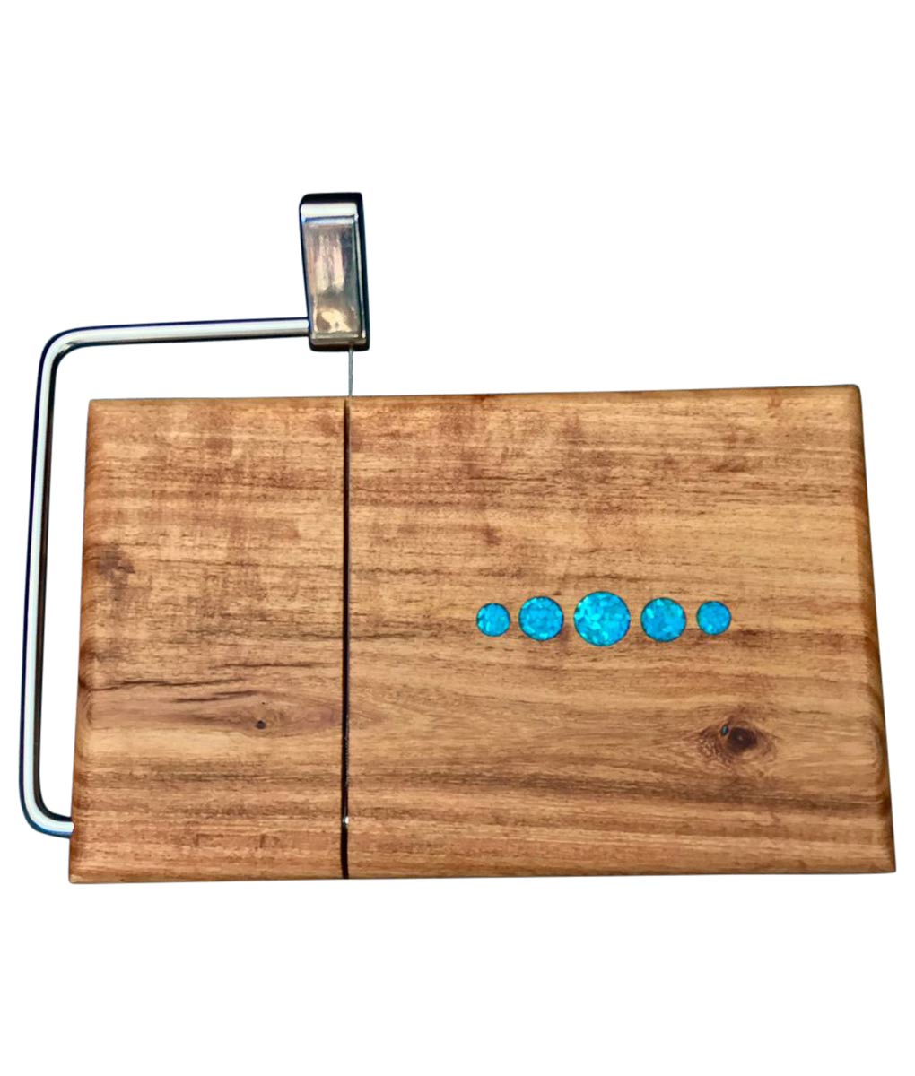 https://rusticartistry.com/wp-content/uploads/2018/11/mesquite-wood-cheese-slicer-cutting-board-with-turquoise-inlay.jpg