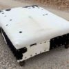 cowhide ottoman in black and white cowhide