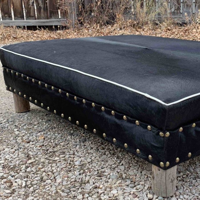 large black cowhide ottoman coffee table
