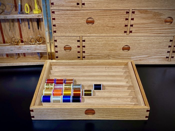 fly tying cabinet with spool crib
