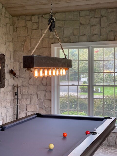 6' wood beam chandelier over pool table