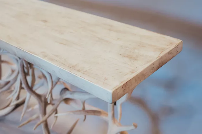 antler sofa table wood top detail