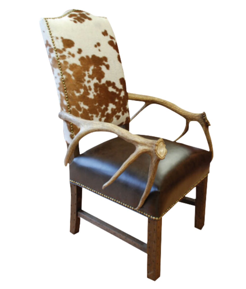 cowhide and leather dining chair with antler arms