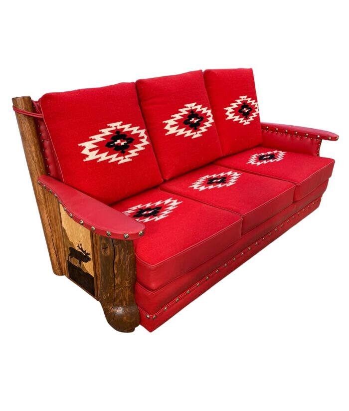 Molesworth 3 seat sofa with red Chimayo cushions and carved side panels