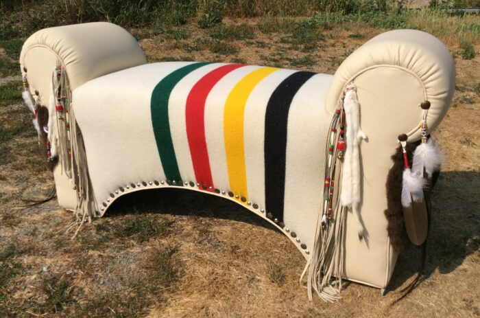 Glacier National Park Pendletonand leather bench with fringe and feathers