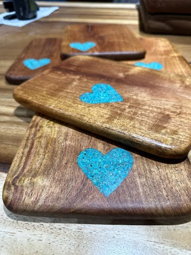 mesquite serving board with turquoise heart inlay